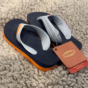 Havaianas Kids Navy Blue Flip Flops with Orange Trim and Light Gray Straps
